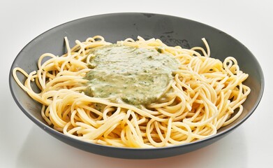  Delicious plate of italian spaghetti pasta with sauce over isolated white background