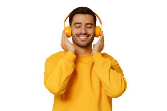 Smiling young man listening music, wearing yellow wireless headphones and sweatshirt, enjoying favorite song with eyes closed