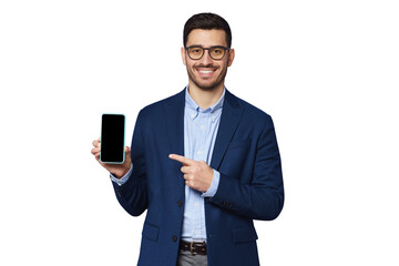 Young businessman showing blank phone screen and pointing to it with finger, copy space for your app - 662397522