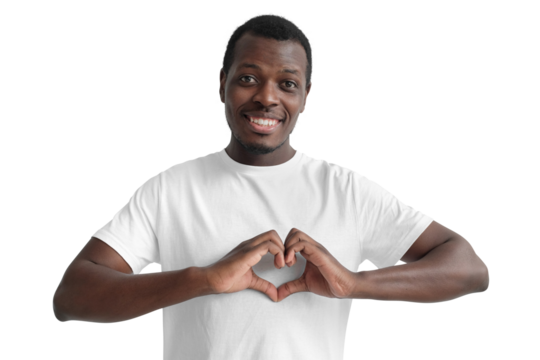 Portrait of young smiling african american man showing heart gesture