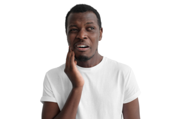 Young african american man having strong toothache, pressing hand to chin because of jaw pain