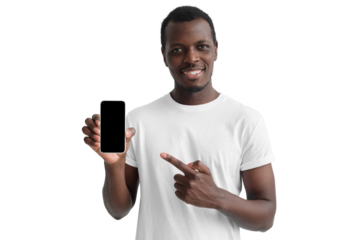 Handsome african american man in white t-shirt showing phone and pointing with finger at blank black screen with copy space