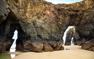 Natural rock arches Cathedrals beach, Playa de las Catedrales at Ribadeo, Galicia, Spain. Famous...