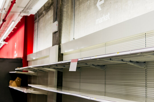 Empty shelves of a supermarket or a store. Economic or consumption crisis concept.