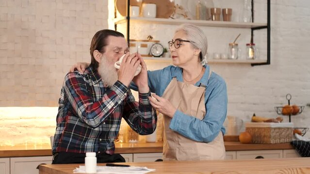 couples eating and enjoying new year together with gifts drinks