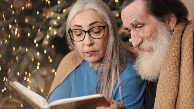 couples eating and enjoying new year together with gifts drinks