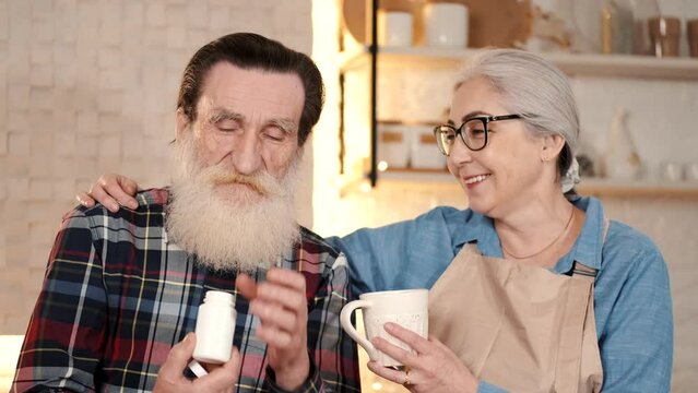 couples eating and enjoying new year together with gifts drinks