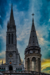 Fototapeta premium Lourdes is a city in southwestern France, in the foothills of the Pyrenees. It is known throughout the world for the Shrines of Our Lady of Lourdes, an important Catholic pilgrimage site.