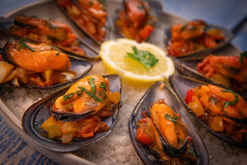RECIPE FOR SPANISH MUSSELS WITH CHORIZO, WHITE WINE SAUCE, PEPPER, TOMATO, ONION. High quality photo