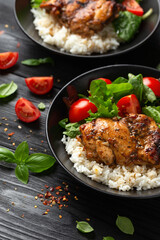 Baked balsamic chicken thighs with rice and vegetables