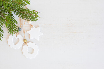 Top view of handmade christmas ornaments made of air dry clay. Xmas crafts, hobby, diy concept