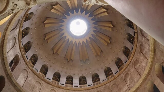 Low angle on the Dome of the Anastasis located above the aedicule in Jerusalem. Holy and famous Christian site located in the Church of the Holy Sepulchre in the old city of Jerusalem, Israel