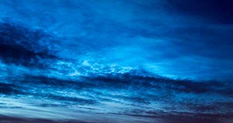 Fototapeta na wymiar Noctilucent clouds at twilight