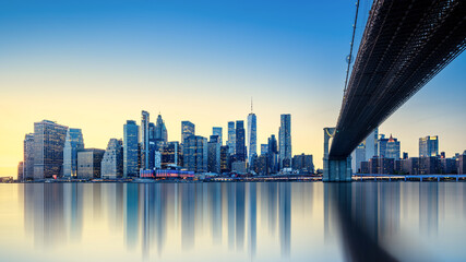 the skyline of new york during sunset