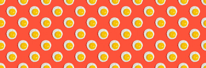 Seamless pattern with sunny side up egg on red background. Food board.