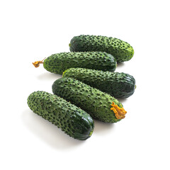 Ripe green cucumbers on a white background