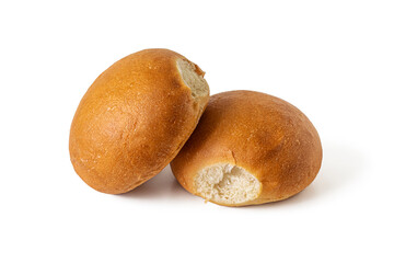 Two round buns with a golden crust on white