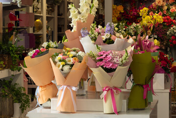 Finished bouquets on the table in the shop. Flower shop concept