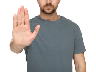Naklejka premium Man showing stop gesture isolated on white, closeup