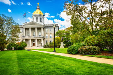 New Hampshire State House, in Concord, on a sunny morning. The capitol houses the New Hampshire General Court, Governor, and Executive Council. - 662435999