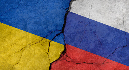 Ukraine and Russia flags, texture of concrete wall with cracks, grunge background, military conflict concept