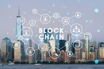 Skyline of New York City Financial Downtown Skyscrapers at sunset. Manhattan, NYC, USA. View from New Jersey. Decentralized economy. Blockchain, cryptography and cryptocurrency concept, hologram