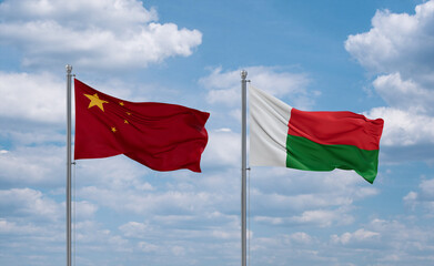 Madagascar and China flags, country relationship concept