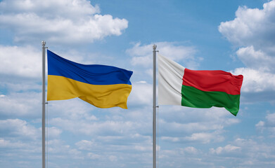 Madagascar and Ukraine flags, country relationship concept