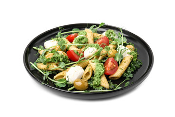 Delicious pesto pasta salad isolated on white