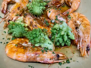 prawn king crevettes, romanesco broccoli  pan fried fresh healthy seafood meal