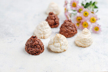 Delicious homemade meringue cookies with coconut flakes.