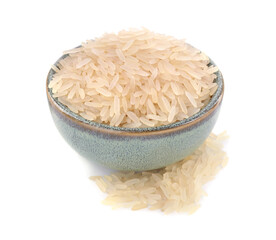 Raw rice in bowl isolated on white