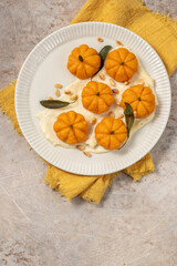 pumpkin shaped gnocchi with brown butter parmesan sauce