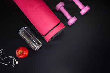 sports flatley. Yoga mat, water, headphones, apple, concept - fitness