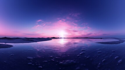 Fototapeta premium The sun is setting over a body of water