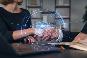 Businesspeople shake hands on great deal at office workplace. Concept of team work, business...