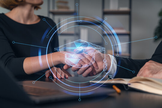 Businesspeople shake hands on great deal at office workplace. Concept of team work, business agreement, partnership, project success. Handshake shot. Education hologram