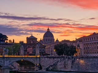 Fototapeta na wymiar Rome sunset over Tiber and St. Peter's Basilica Vatican, Italy