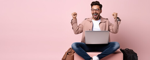 Joyful surprised man sitting with laptop on his lap in winning pose isolated on flat pastel background with copy space. Online giveaway banner template.  - obrazy, fototapety, plakaty