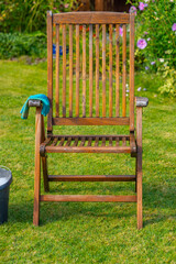 Wood furniture cleaning, wooden garden chair - care and maintenance of wood with water and mild detergent