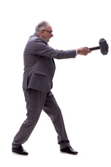 Old businessman holding big hammer isolated on white