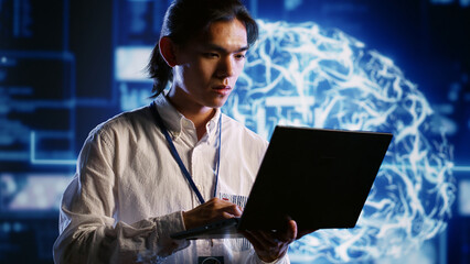 Trained IT consultant works with artificial intelligence computerized model simulating human brain....