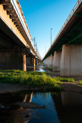 Fototapeta na wymiar Inbetween bridges at the river, Tama river, Tokyo, Japan