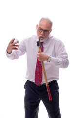 Old businessman shaving face with hatchet isolated on white