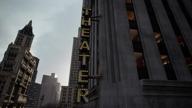 A tall building with a sign that says theater