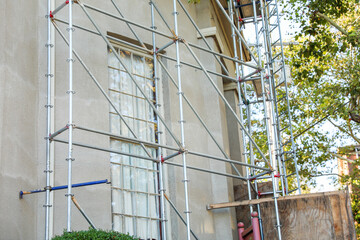 construction site with workers, heavy machinery, and scaffolding, showcasing the vibrant energy and progress of urban development