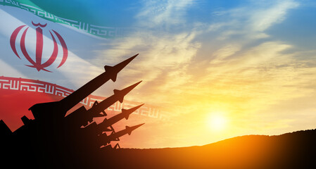 The missiles are aimed at the sky at sunset with Iran flag. Bomb, chemical weapons, missile...