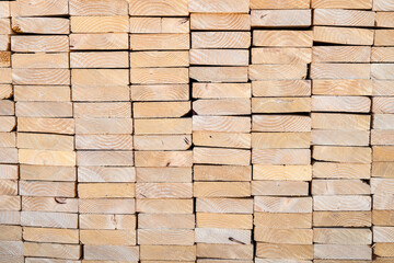 End view of a stack of lumber, materials for building a new house
