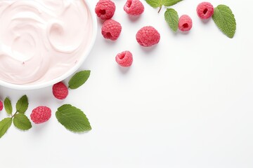 Delicious yogurt with raspberries and mint isolated on white with a curl