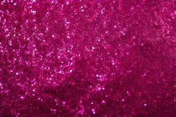 Sparkles on a magenta fuchsia background perfect for a backdrop